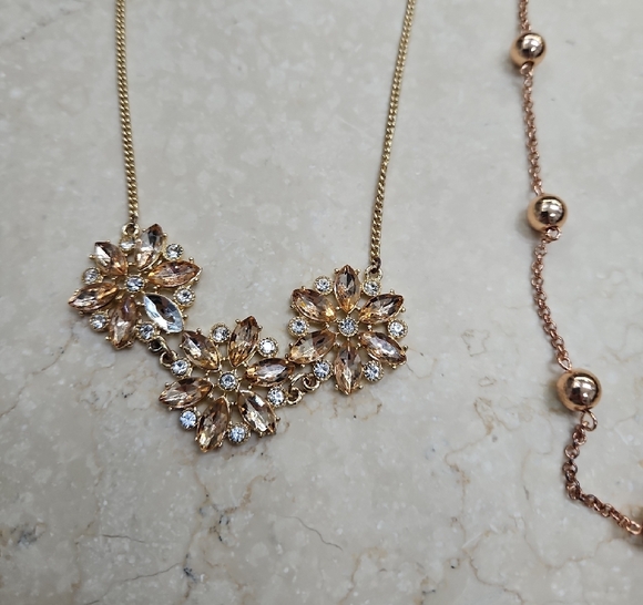 Ornate Silver and Rose Gold Necklace Trio with Intricate Pendants - Picture 2 of 4